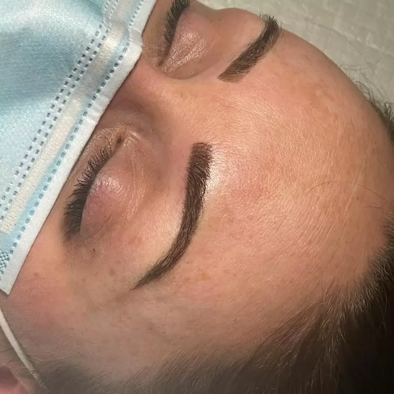 Permanent eyebrow microblading natural shaped brows