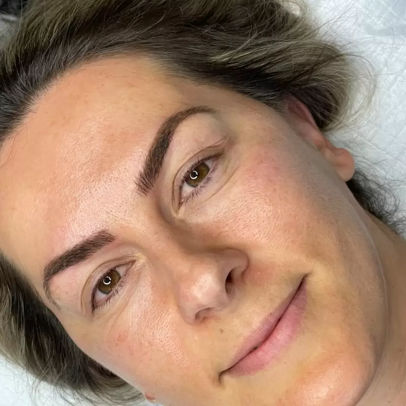 Permanent eyebrow microblading natural shaped brows